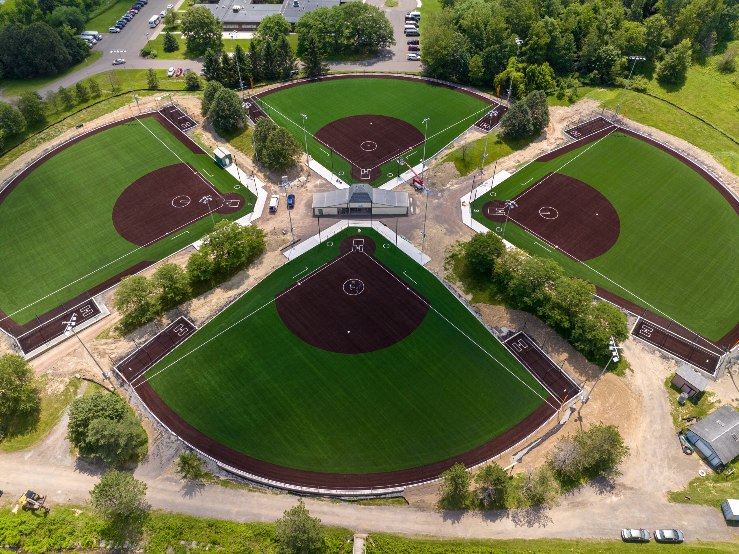 Four baseball diamonds from an aerial view
