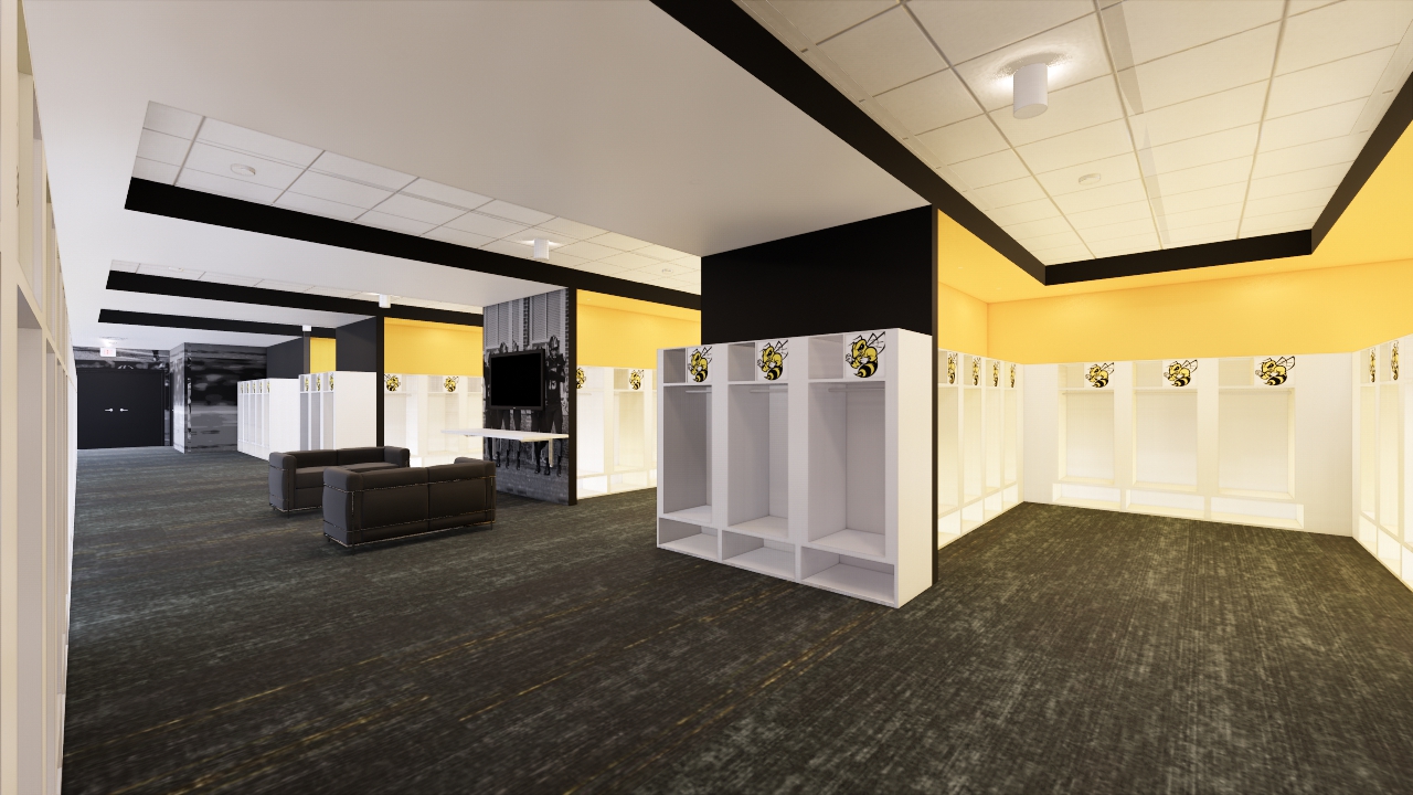 The interior of a gold and black locker room design is shown. There are white cubbies with bee logos above them.