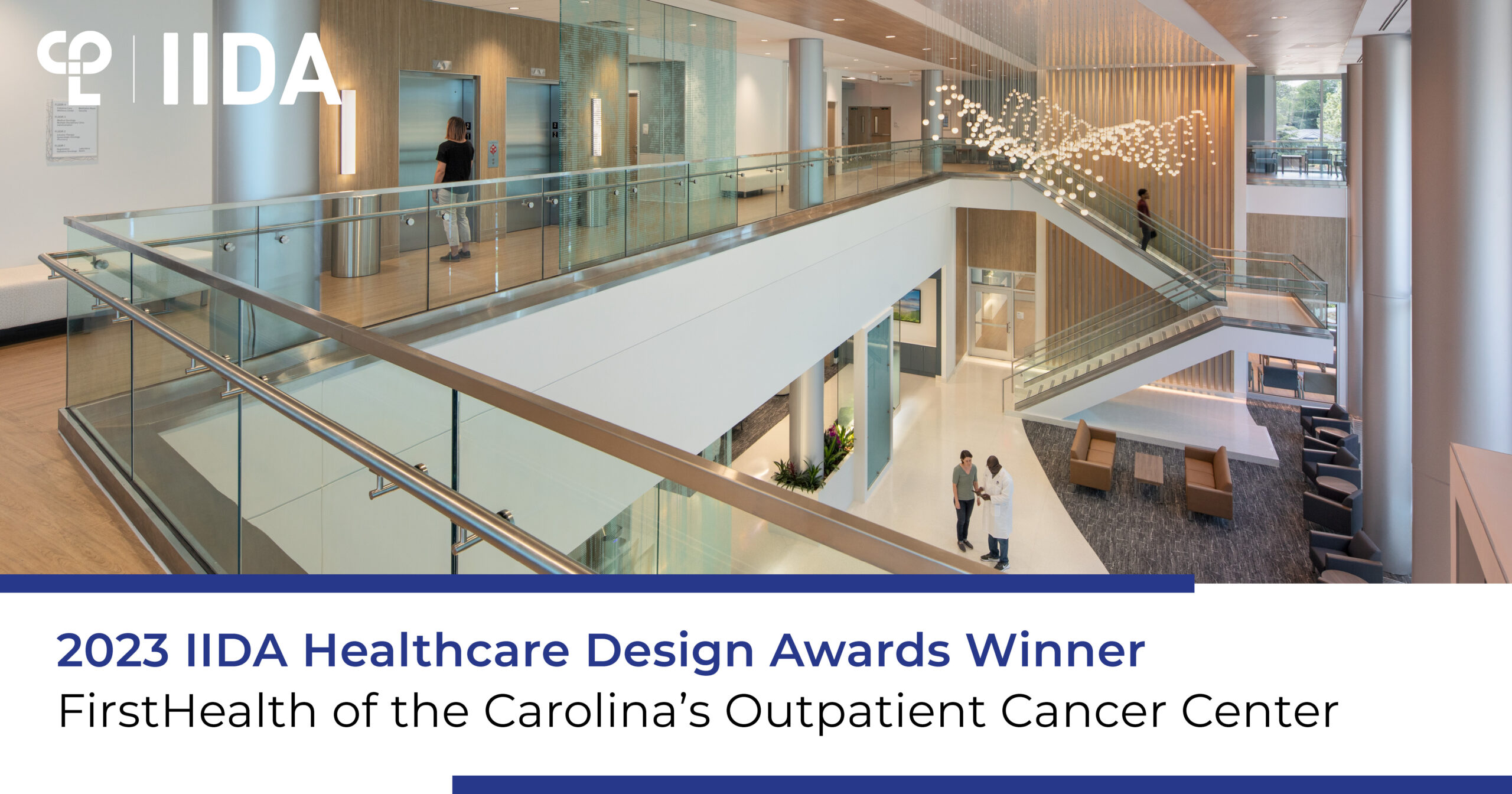 Image is a graphic that shows a hospital lobby from the second floor looking down onto the first floor. Stairs can be seen in the distance. There's a modern light fixture. In the left corner is the CPL logo and the IIDA logo. At the bottom it reads "2023 IIDA Healthcare Design Awards Winner FirstHealth of the Carolina's Outpatient Cancer Center"