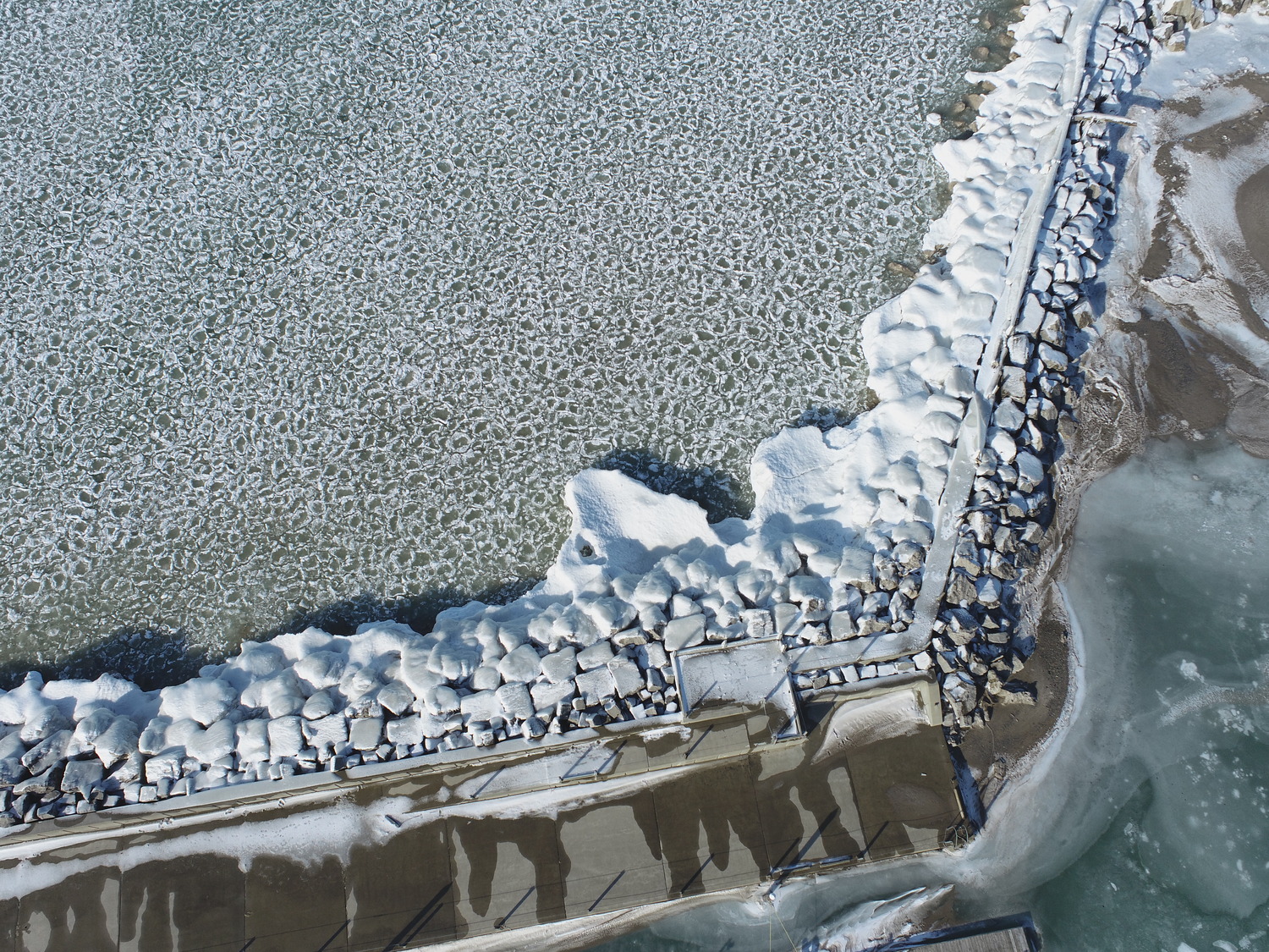 An aerial view of the breakwall at Sturgeon Point Marina