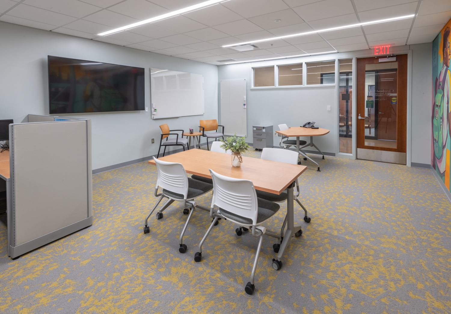 A meeting and hang-out area like this one in the Lift Up Vikes space is one way design elements can positively impact the success of these campus assets.