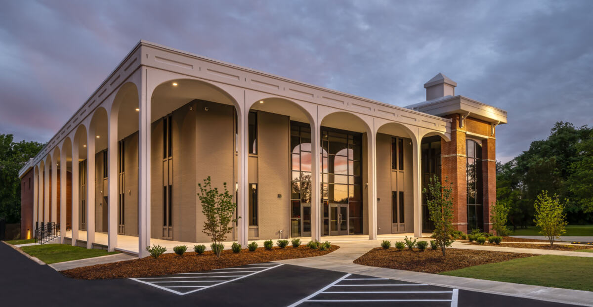 View at dusk of courthouse landscaping and lighting from a corner angle