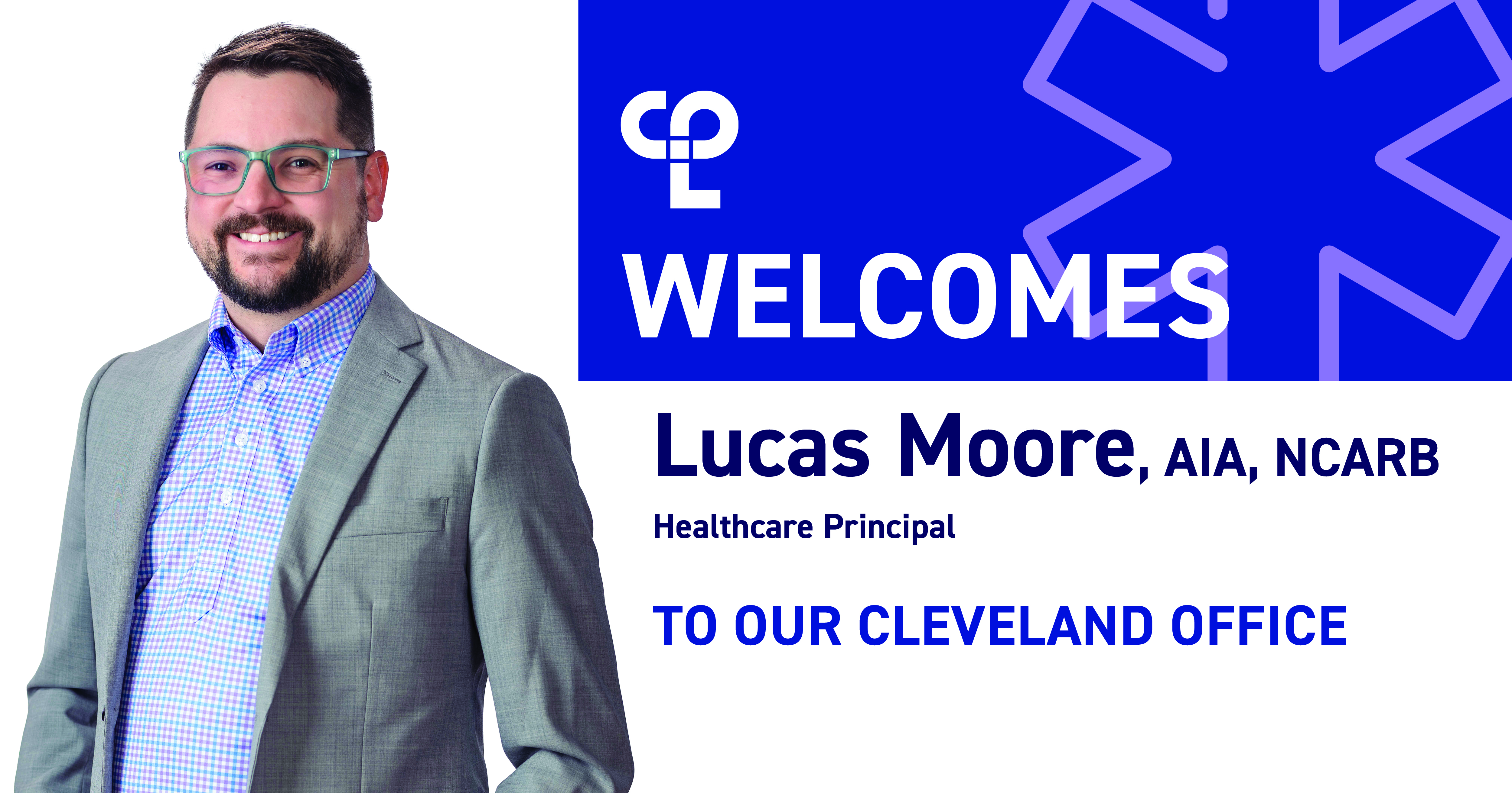 The image shows a professional photo of Lucas Moore, a man with a beard and glasses, dressed in a gray blazer over a plaid shirt. The text on the image reads: 'WELCOME' at the top, followed by 'Lucas Moore, AIA, NCARB, Associate Healthcare Principal' below his name. At the bottom, it says 'TO OUR CLEVELAND OFFICE.' The background is a solid blue with a healthcare-related symbol.