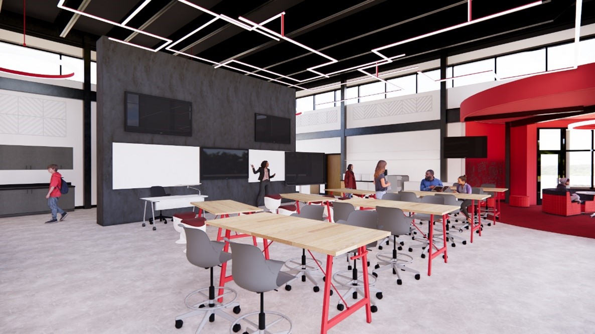 This conceptual rendering of a presentation space in a Middle/High School STEAM wing is designed to facilitate interactive project showcases. The classroom is open concept with dark gray walls, red accent colors, wall-mounted TVs and movable chairs and tables.