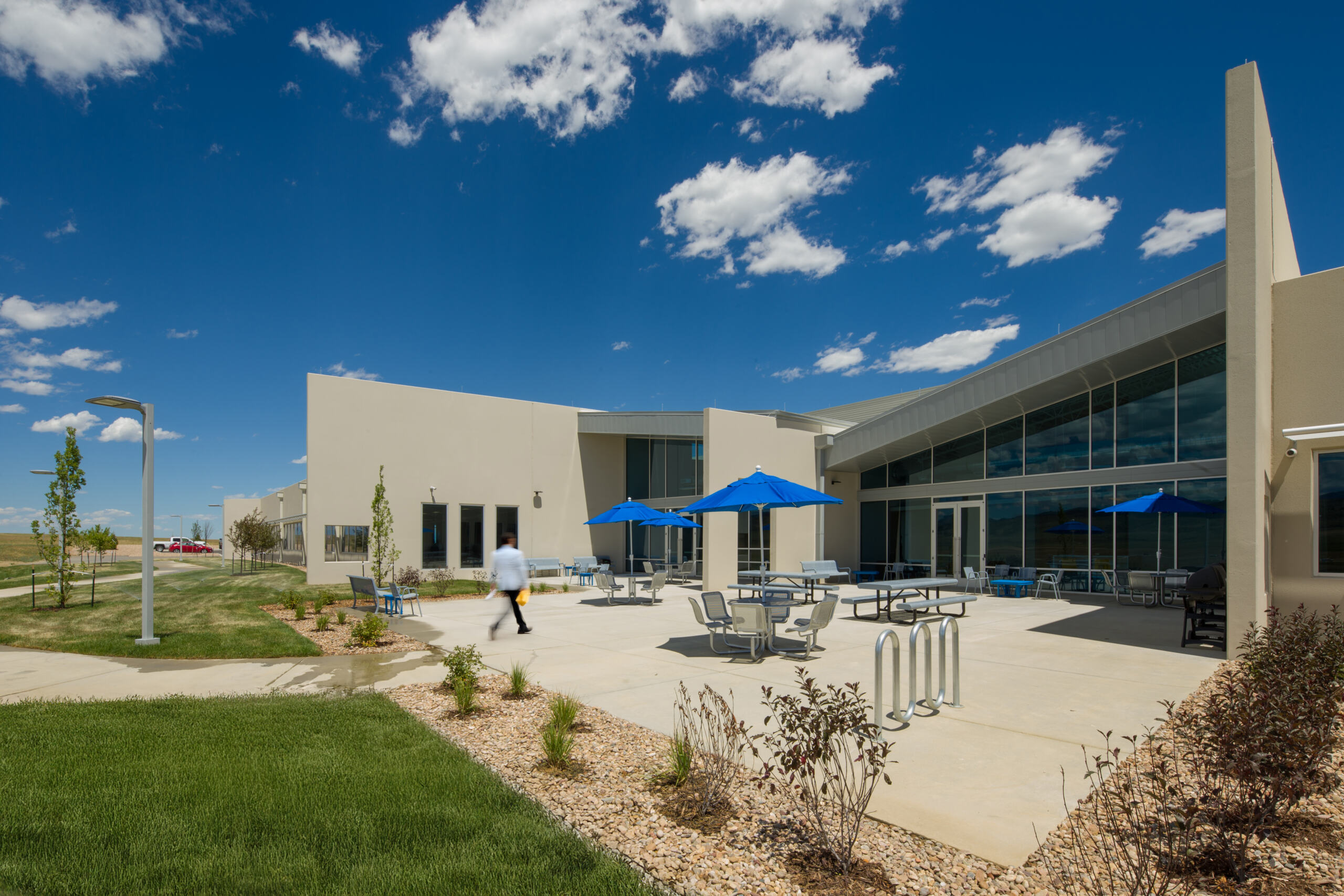 Outdoor patio at Nordson Value Plastics with blue umbrellas