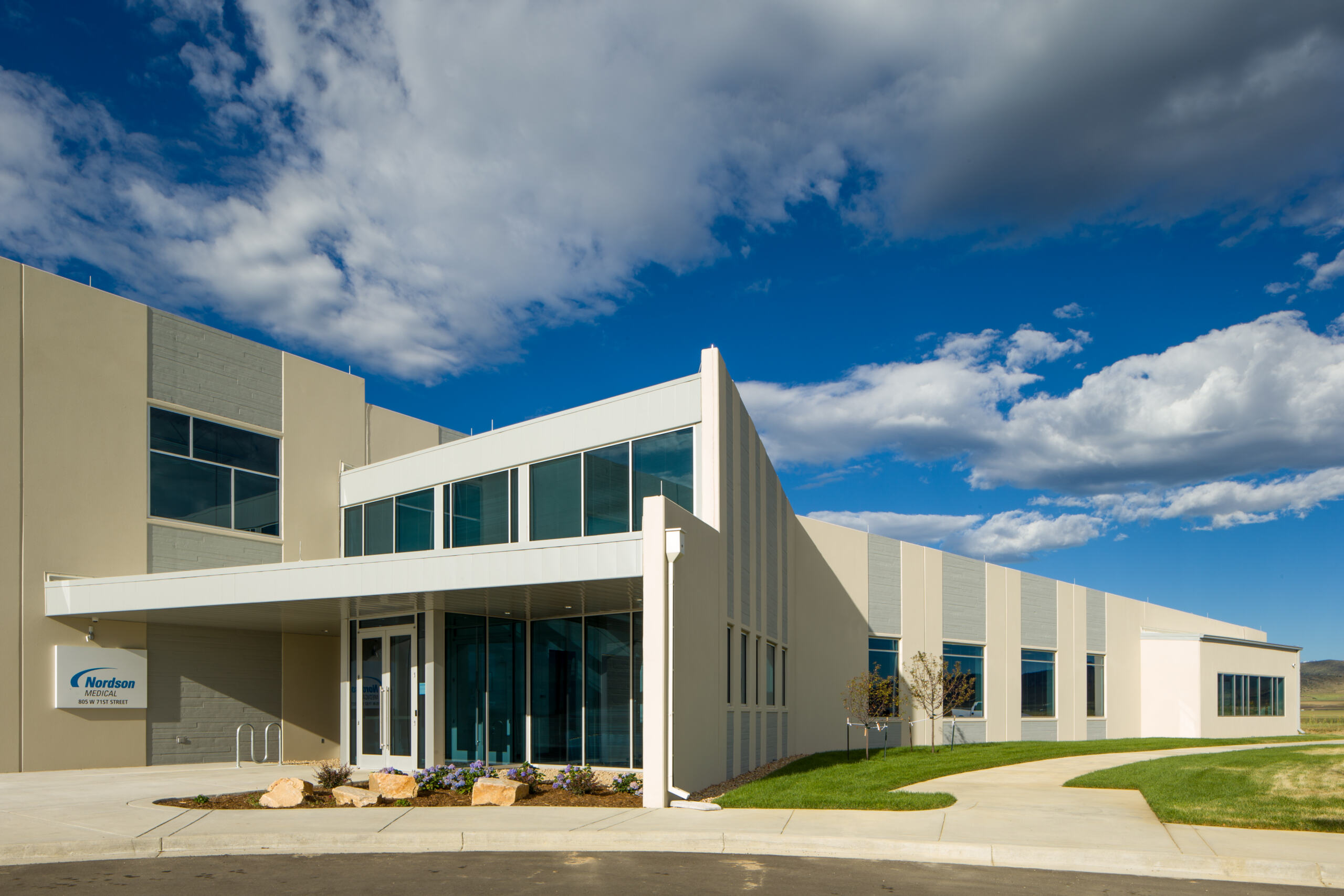 Exterior of angular grey building that says "Nordson Medical