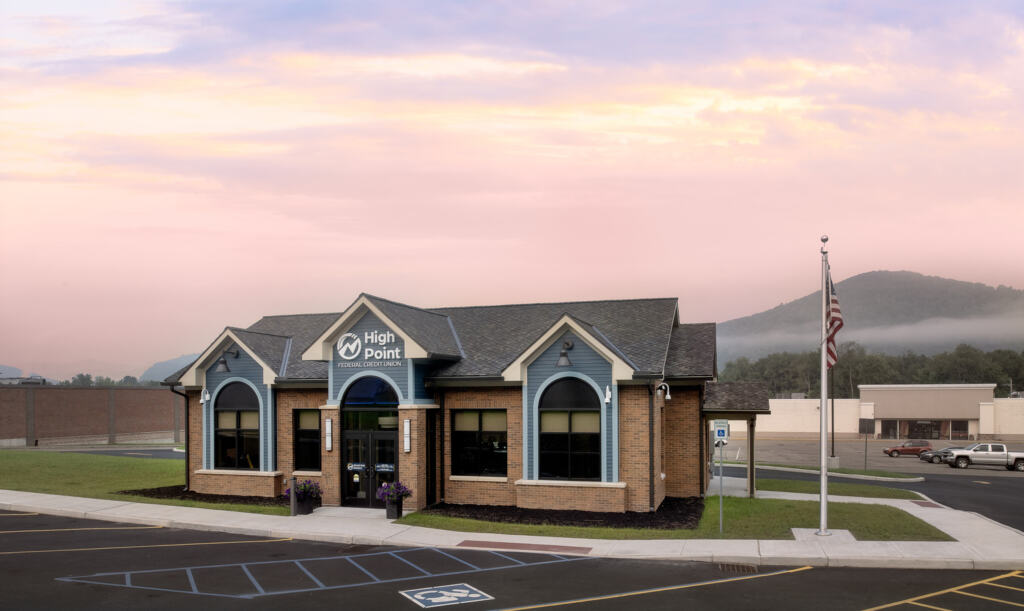 The front of the High Point FCU Bradford Branch at sunset.