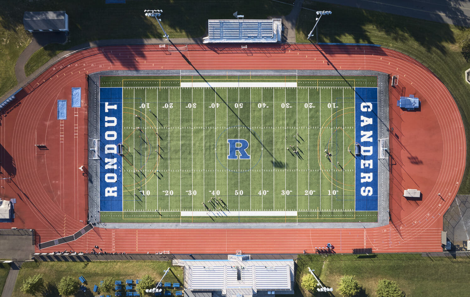 Completed Rondout Valley CSD football field circled by a red track, with "Rondout Ganders" printed in all caps in the end zones.
