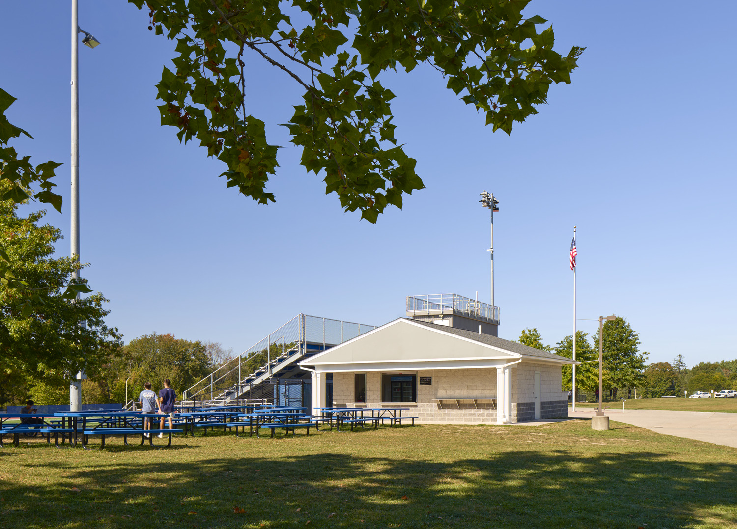 R19_14206_05_RondoutAthletics_medium Stands, concession building, and gathering space with picnic tables as part of the Rondout Valley CSD athletic complex renovation.