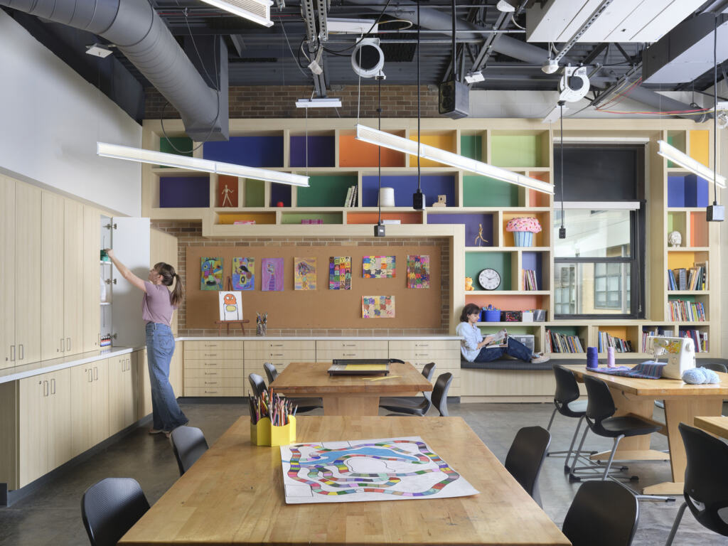 Part of Fillmore's Capital Improvement Plan, a renewed art classroom with colorful bookshelves and a surplus of cabinet storage.
