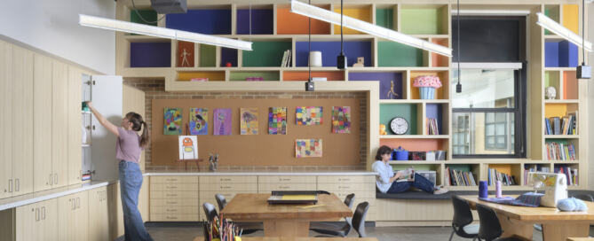 Part of Fillmore's Capital Improvement Plan, a renewed art classroom with colorful bookshelves and a surplus of cabinet storage.
