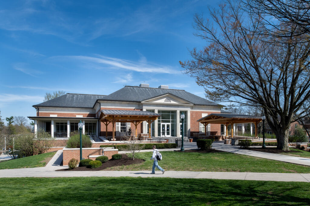 Renovated Ford Dining Hall at Mercersburg Academy featuring brick architecture, tall windows, and landscaped campus grounds as part of a campus dining hall renovation.